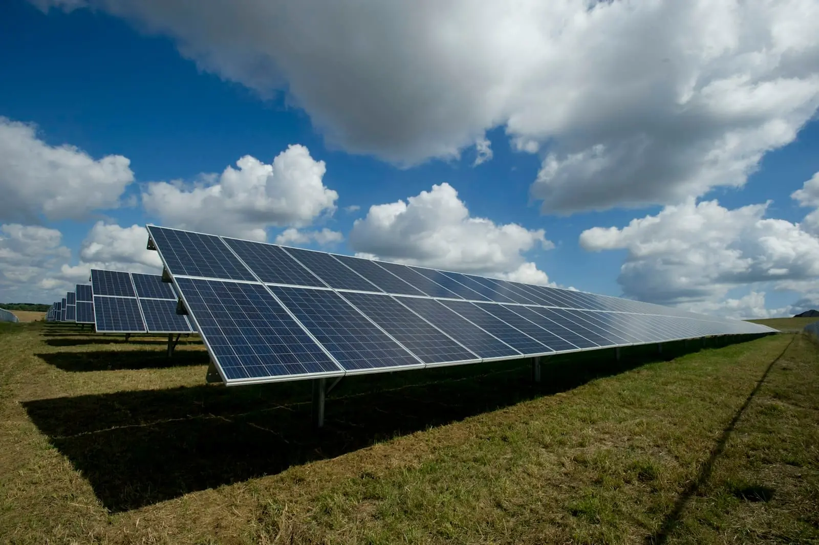 Ground-mounted solar panel array installation